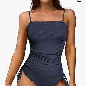 Size small bathing suit with adjustable sides.